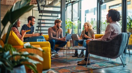 Team having a casual meeting in a breakout area, highlighting flexibility and communication