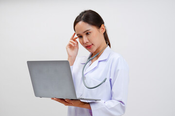 Smiling female doctor using smartphone in medical work.