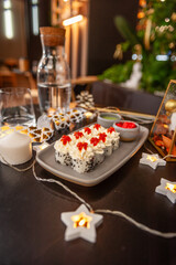 Sushi roll with cream cheese, sesame seeds and salmon caviar