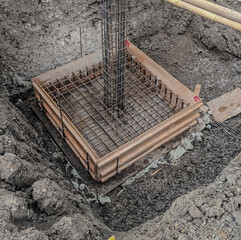 Formwork with reinforcement bar for pad footing. Construction of pad footing foundation where the...