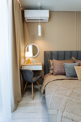 Experience a Cozy Modern Bedroom Design that features elegant air conditioning and stylish decor for ultimate comfort and relaxation