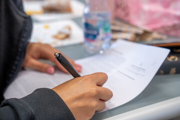 A female model signs a model release