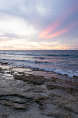 Beach in Fuvamulah in the Maldives with beautiful light in the sky