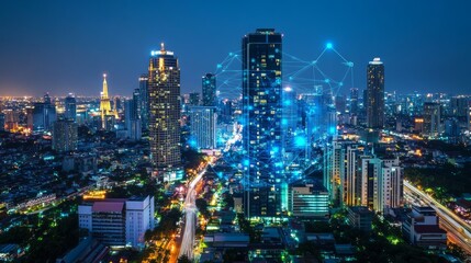 Obraz premium Night cityscape with glowing network connections over skyscrapers.