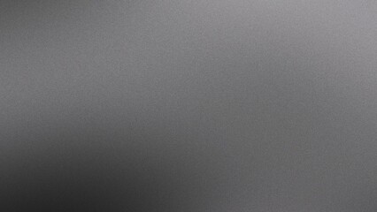 A gradient backdrop featuring black, gray, and white hues, enhanced by a grainy noise texture effect, perfect for use in web banners and poster designs