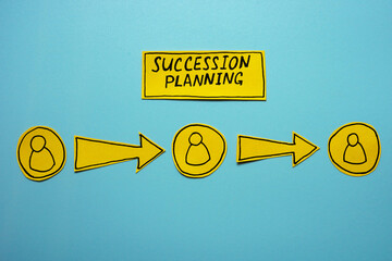 Figures, arrows and phrase succession planning. Leadership transition.