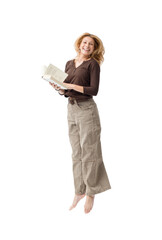 Fototapeta premium Cheerful smart woman reading a book and jumping