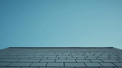 Fototapeta premium Neatly arranged roof shingles, ample copy space in the sky above