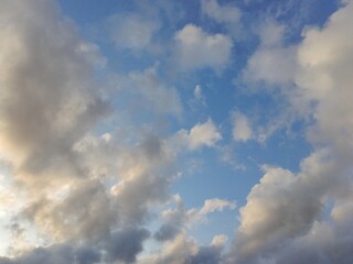 beautiful cloudy sky sunlight from the side, dramatic feel, it's going to rain