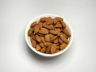 Roasted almond in a white bowl