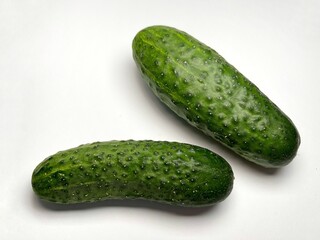 Fresh short cucumber isolated on white background