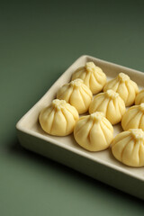 Chinese dumplings served on a tray. Traditional chinese cuisine