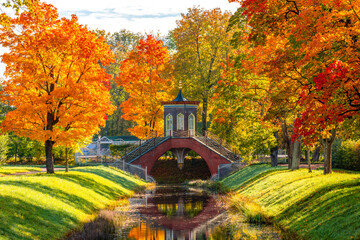 Cross bridge in golden autumnl in Alexander park, Tsarskoe Selo (Pushkin), Saint Petersburg, Russia