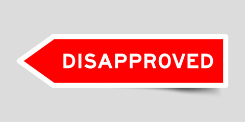Red color arrow shape sticker label with word disapproved on gray background