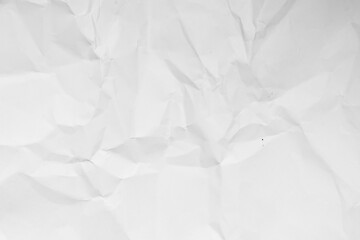 Grunge wrinkled white color paper textured background with copy space. Use for decoration or layer