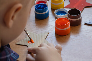 children's creativity. child draws, hands close-up