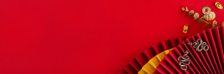 Chinese asia New Year golden red background. New zodiac year Snake 2025 greeting card. Red flat lay...