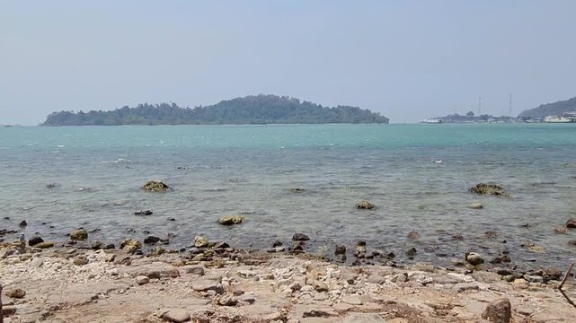 Small Merak Island, blue sea