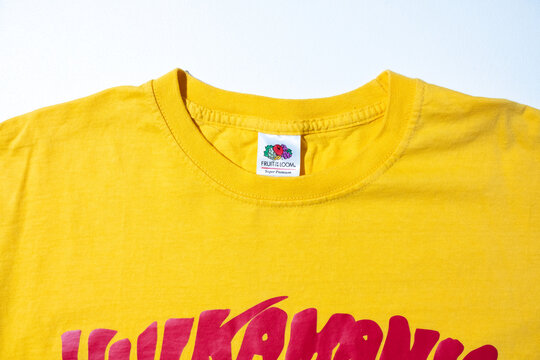 Kent, uk 01.01.2024 hulk hogan hulkamania yellow vintage tshirt fruit of the loom. Hulk wrestling unites states of America Americana merchandise. Fruit of the loom yellow t-shirt double stitch.