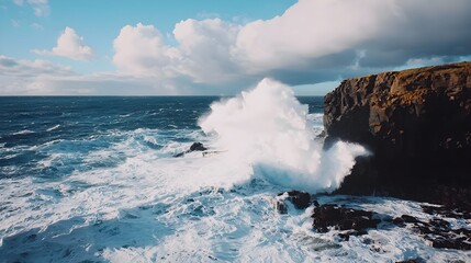 Powerful Ocean Wave Crashing Against Rocky Cliffs,Symbolizing Nature's Might