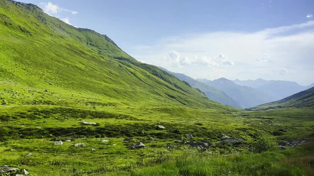View From Glacier Express Train on a Beautiful Mountain Valley and Mountainscape in a Sunny Summer Day in Oberalp Pass, Sedrun, Surselva, Oberalp, Grisons, Switzerland.