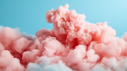 An imaginative photo showcasing fluffy pink cotton candy clouds against a clear sky backdrop, evoking childlike wonder and playful creativity.