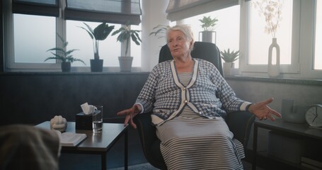 Elderly patient discusses progress in therapy with psychologist. Woman shares her experience and...