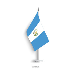 Guatemala table flag on light grey background. Guatemala desk flag isolated on grey background	