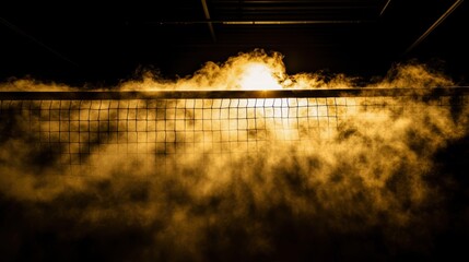 Silhouette of a volleyball net against a glowing backdrop, creating an atmospheric and dramatic effect.