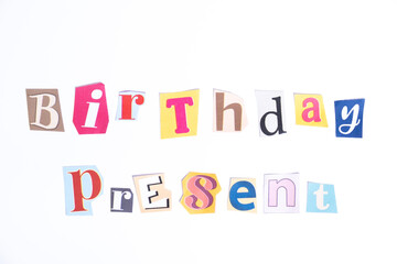 Happy Birthday symbol. Concept words Birthday Present isolated on clean white background in fun cut out newspaper style typescript. Concept birthday celebration.