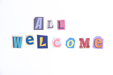 Welcome symbol. Concept words All Welcome isolated on clean white background in fun cut out newspaper style typescript. 