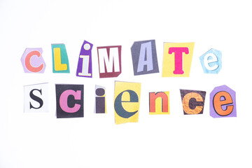 Phrase Climate Science spelled in cut out newspaper style typography isolated on white background.