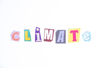 Phrase Climate spelled in cut out newspaper style typography isolated on white background.