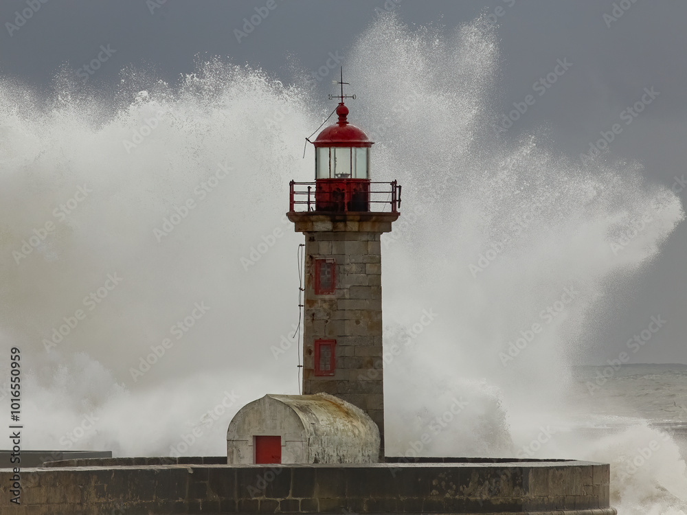 Poster Stormy wave splash in the old lighthouse