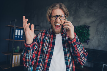 Photo of aggressive young bearded guy having phone call talking about bad proposition offer it company low profit indoors loft office