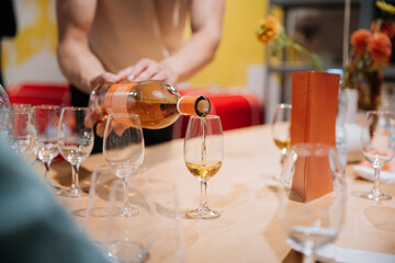 Pouring premium whiskey into glasses at a tasting event, Luxury, celebration, and social gatherings