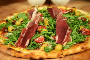 pizza with ham and vegetables