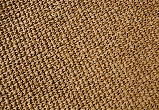 Beige raffia crochet texture. Crocheted bags, clutches, hats, wallets.