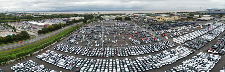 Obraz premium Aerial Ultra Panoramic View of Sea Port and Docks at Avonmouth Bristol City of England United Kingdom During Cloudy Day of August 24th, 2024