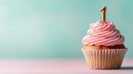 A delicious pink cupcake with swirled frosting is topped by a candle shaped like the number one, against a soft pastel background highlighting its festive charm.