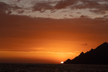 Corsican sunset, behind the headland