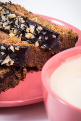 Zucchini dough and cup of white coffee. Delicious dessert. White background