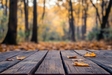 Fototapeta premium Composition with copy space for autumn background. Wooden table and colored leaves.