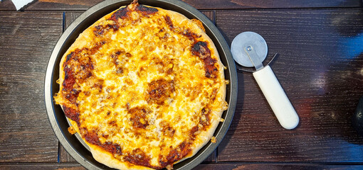 Delicious homemade Italian pizzas are on the table.