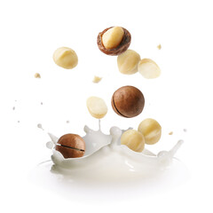 Macadamia nuts and splashing milk in air on white background