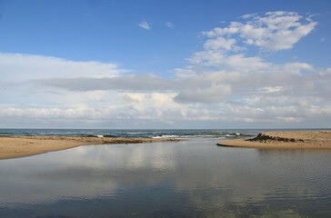 Fototapeta premium The confluence of the Kamchia River with the Black Sea (Bulgaria)