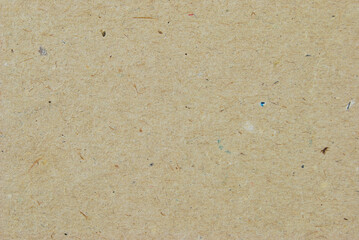 A sheet of recycled cardboard texture as background