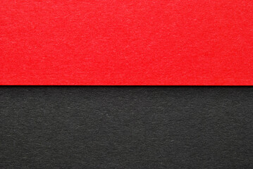 Fototapeta premium A paper background of two colors red and black for your text or design