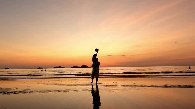A couple is circling each other in the sea as the sun sets. The atmosphere is very romantic.