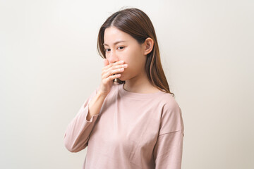 Bad smelling, deodorant asian young woman hand squeeze, covering nose smell stink, breathing smelly...